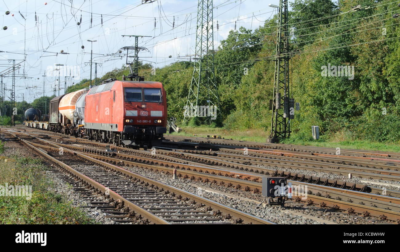 DB Class 145 electric locomotive with mixed manifest wagons at  Koln-Gremberg, Germany Stock Photo - Alamy