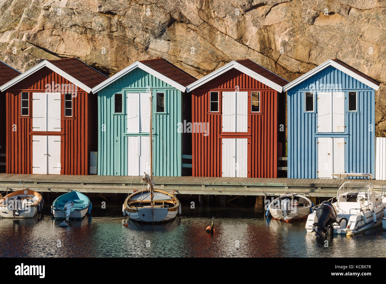 Boats and colourful boathouses in the harbour of Smögen, Smögenbryggan ...