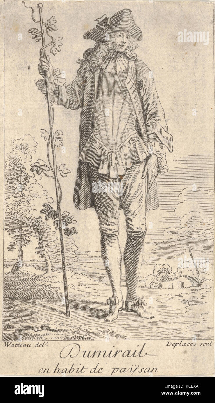 Man in tricorn hat and overcoat, shown in frontal view and holding a staff with a winding vine, landscape with trees beyond Stock Photo