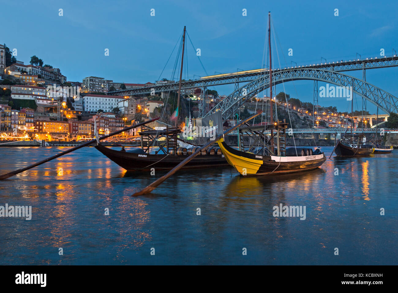 Rabelo boats, Port wine boats on the river Rio Douro, twilight, Porto, Portugal Stock Photo