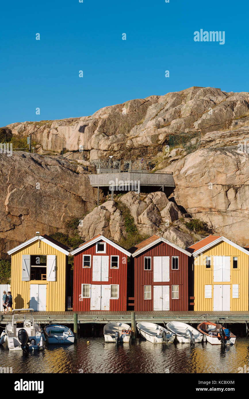 Boats and colourful boathouses in the harbour of Smögen, Smögenbryggan ...