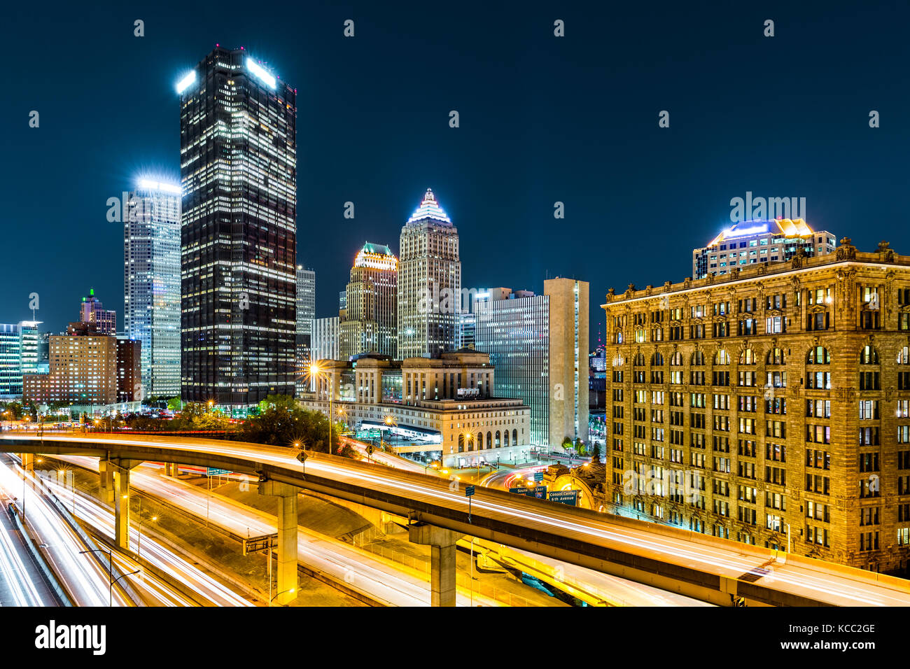 Rush hour traffic trails in downtown Pittsburgh, Pennsylvania Stock