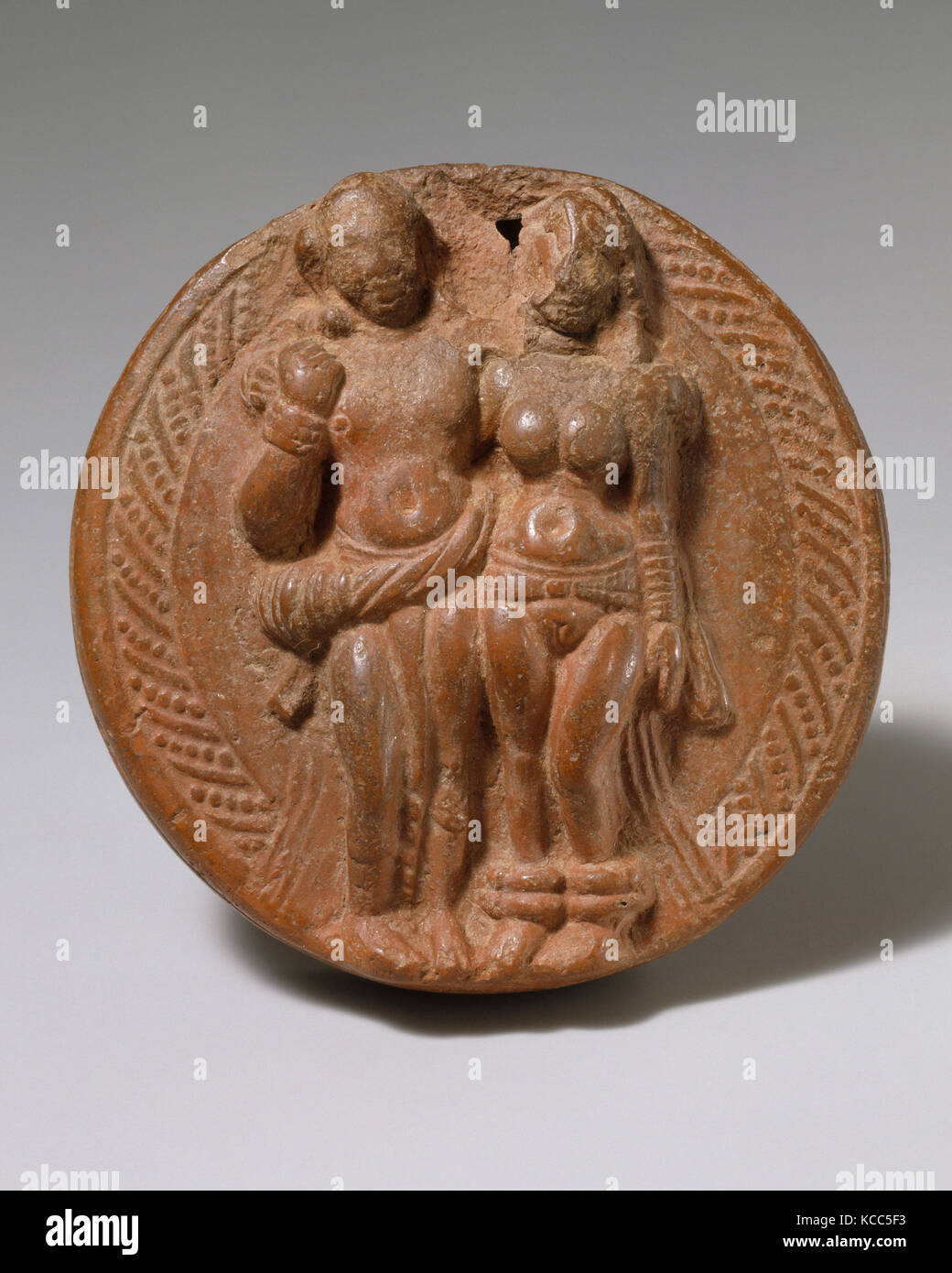 Loving Couple (Mithuna), Kushan period, 1st–2nd century, India (Uttar Pradesh, Mathura), Double-molded terracotta, D. 1 3/8 in Stock Photo