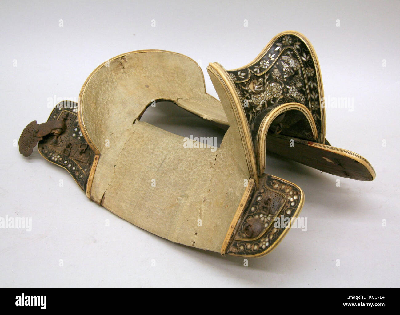 Saddle, 15th century, Korean, Wood (ebony), lacquer, brass, mother-of-pearl, ivory, iron, silk, leather, silver, H. 10 1/2 in Stock Photo