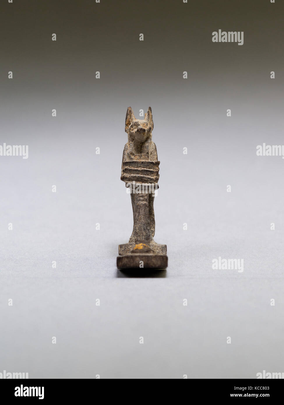 Anubis (?) supporting a large djed pillar, 664–30 B.C Stock Photo