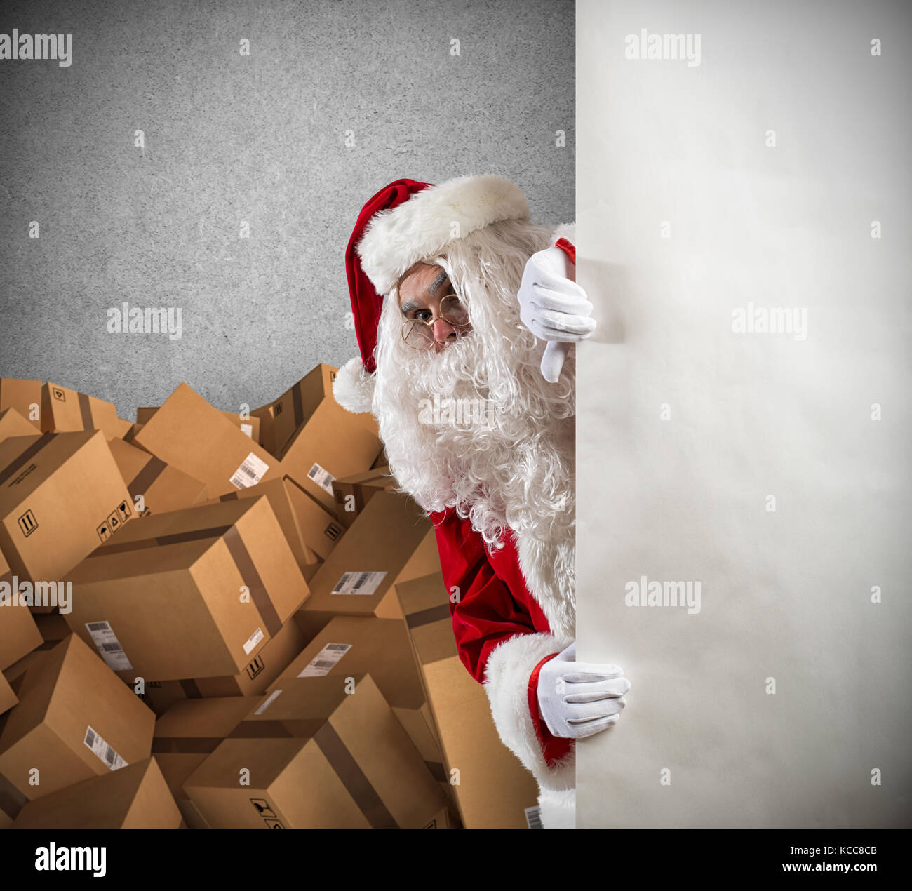 Santa Claus ready to deliver a lot of Christmas presents package Stock Photo