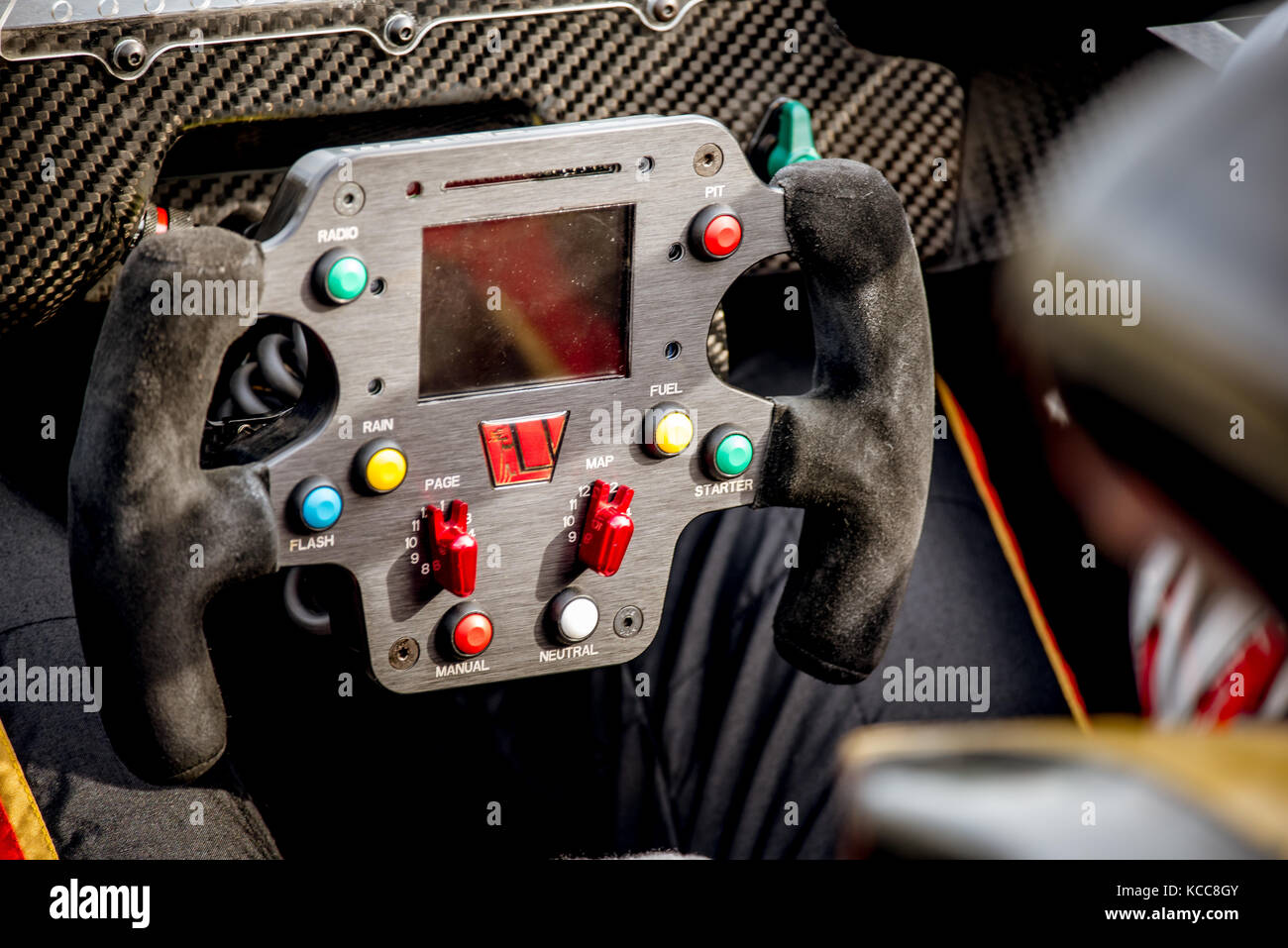 Vallelunga, Italy september 24 2017. Racing car steering wheel with pushbutton commands close up colorful detail Stock Photo