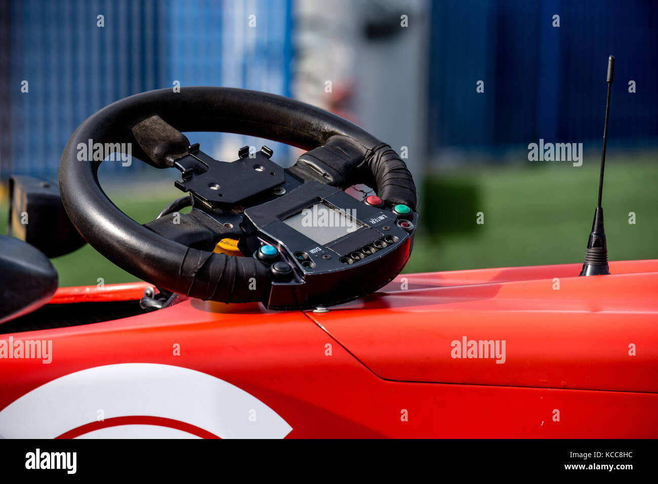 Single seater formula racing car steering wheel out of cockpit detail Stock Photo