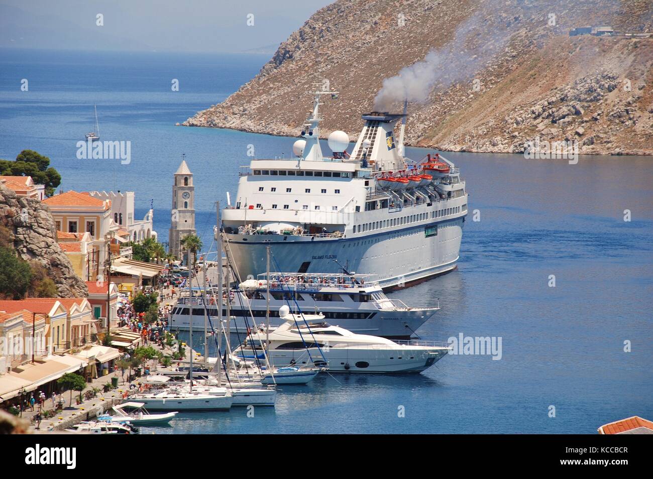 Cypriot cruise ship Salamis Filoxenia docked at Yialos harbour on the Greek island of Symi on June 23, 2011. The 157mtr vessel was built in 1975. Stock Photo