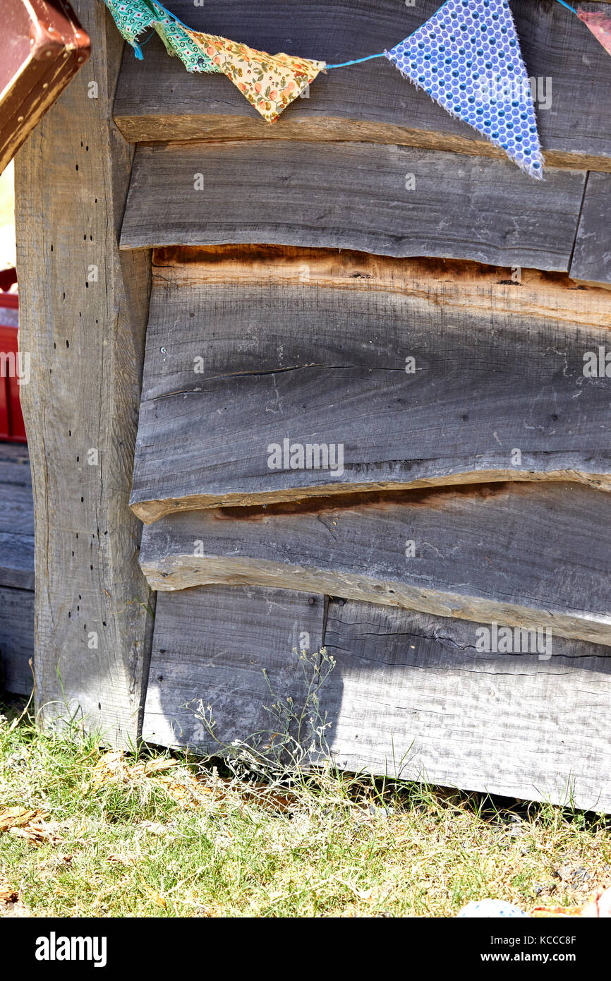 Slats of wood with hand cut bunting Stock Photo Alamy