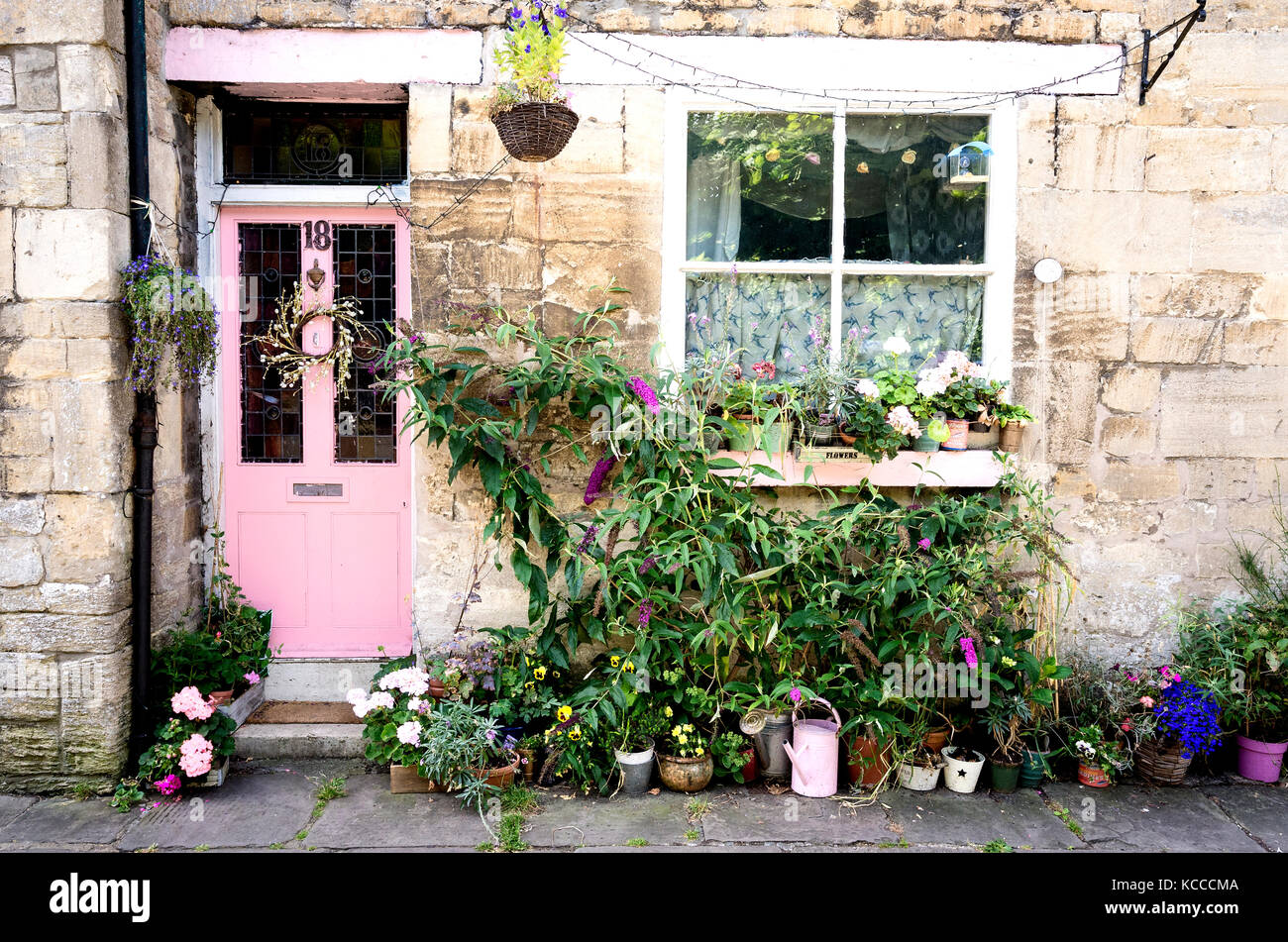 A potted front garden for a town cottage in central Bradford on Avon Wiltshire England UK Stock Photo