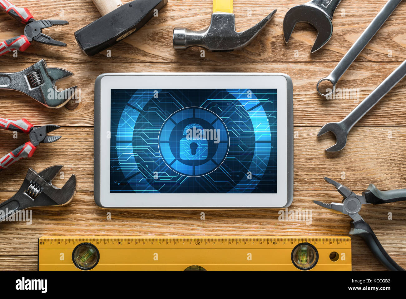 Web security and technology concept with tablet pc on wooden table ...