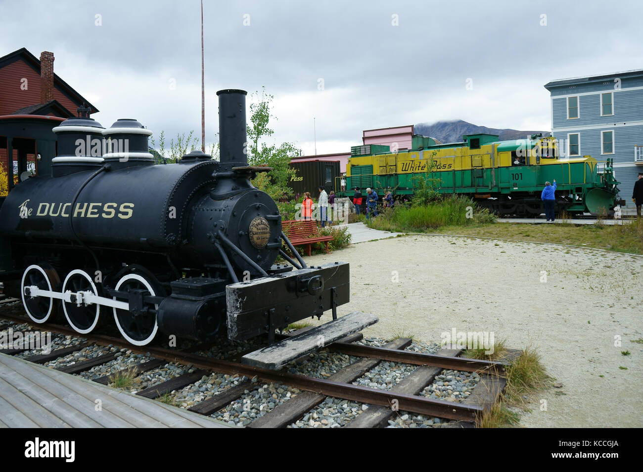 Old 'Duchess' steam lokomitive in front of modern diesel lokomotive of White Pass train at Carcross station, Yukon Territory, Canada Stock Photo