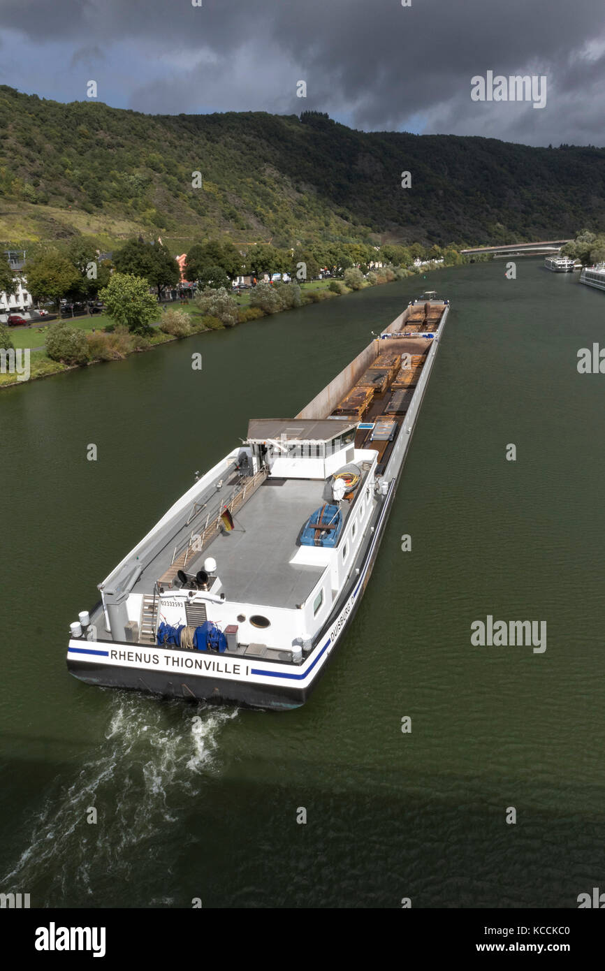 A barge, Rhenus Thionville 11, carrying sheet metal at Cochem, Mosel Valley, Germany Stock Photo