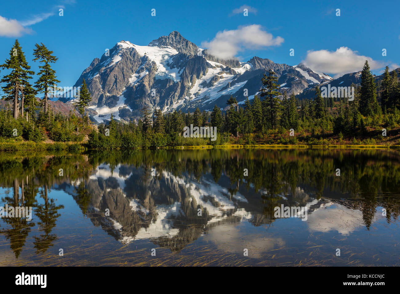 Mount Shuksan reflected in Picture Lake, North Cascades, Mount Baker Wilderness, Washington, USA. Stock Photo