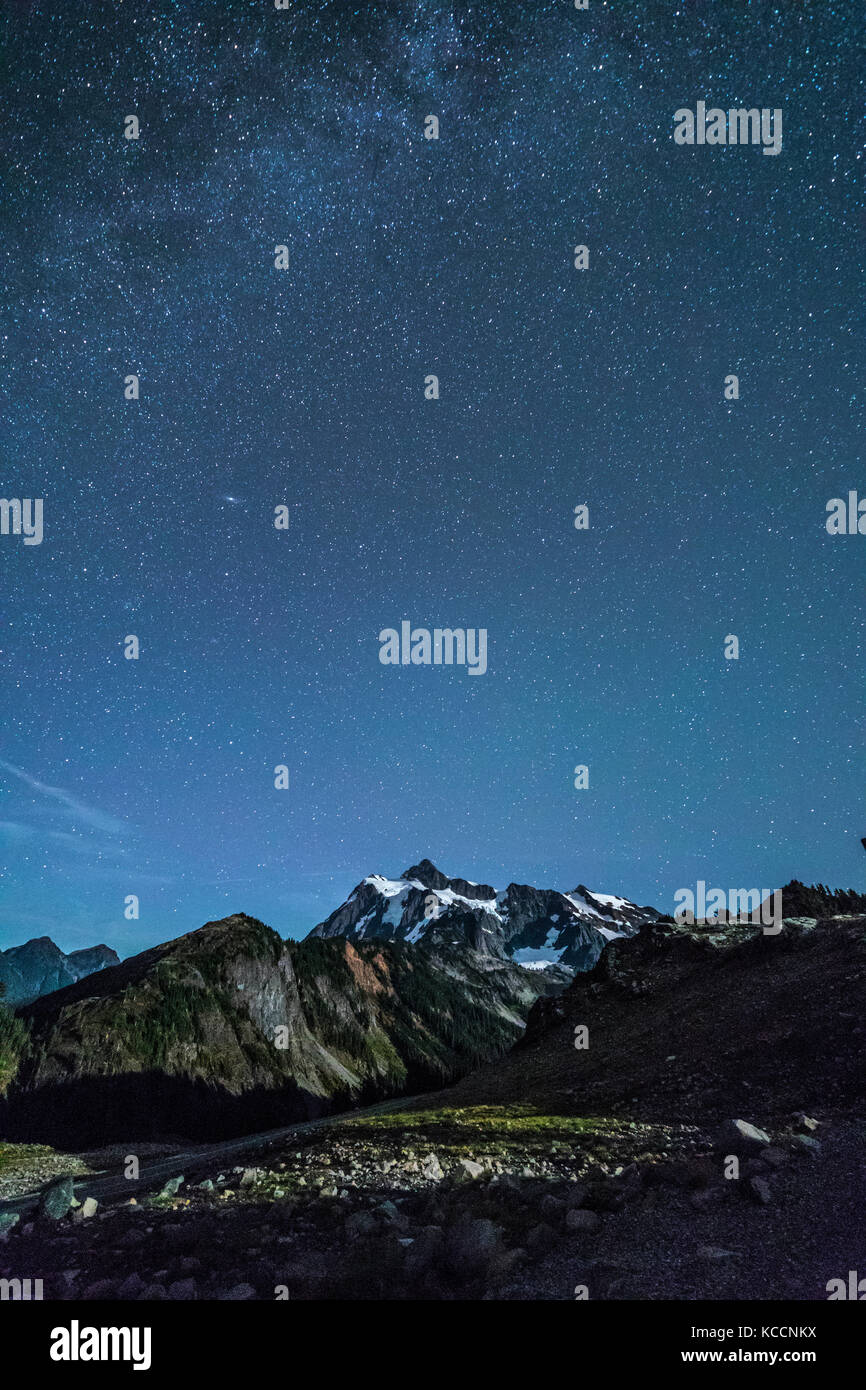 A star-filled sky over Mount Shuksan, North Cascades National Park, Washington, USA. Stock Photo