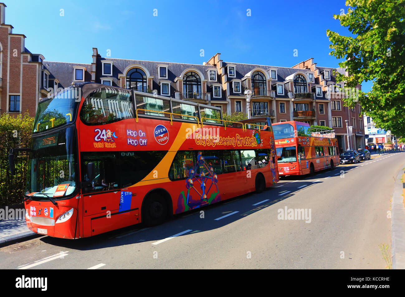 Brussels, Belgium - July 17, 2017: Red tourist buses of City Sightseeing Brussels. Famous Hop-On Hop-Off tourist buses on a sunny day in Brussels. Stock Photo