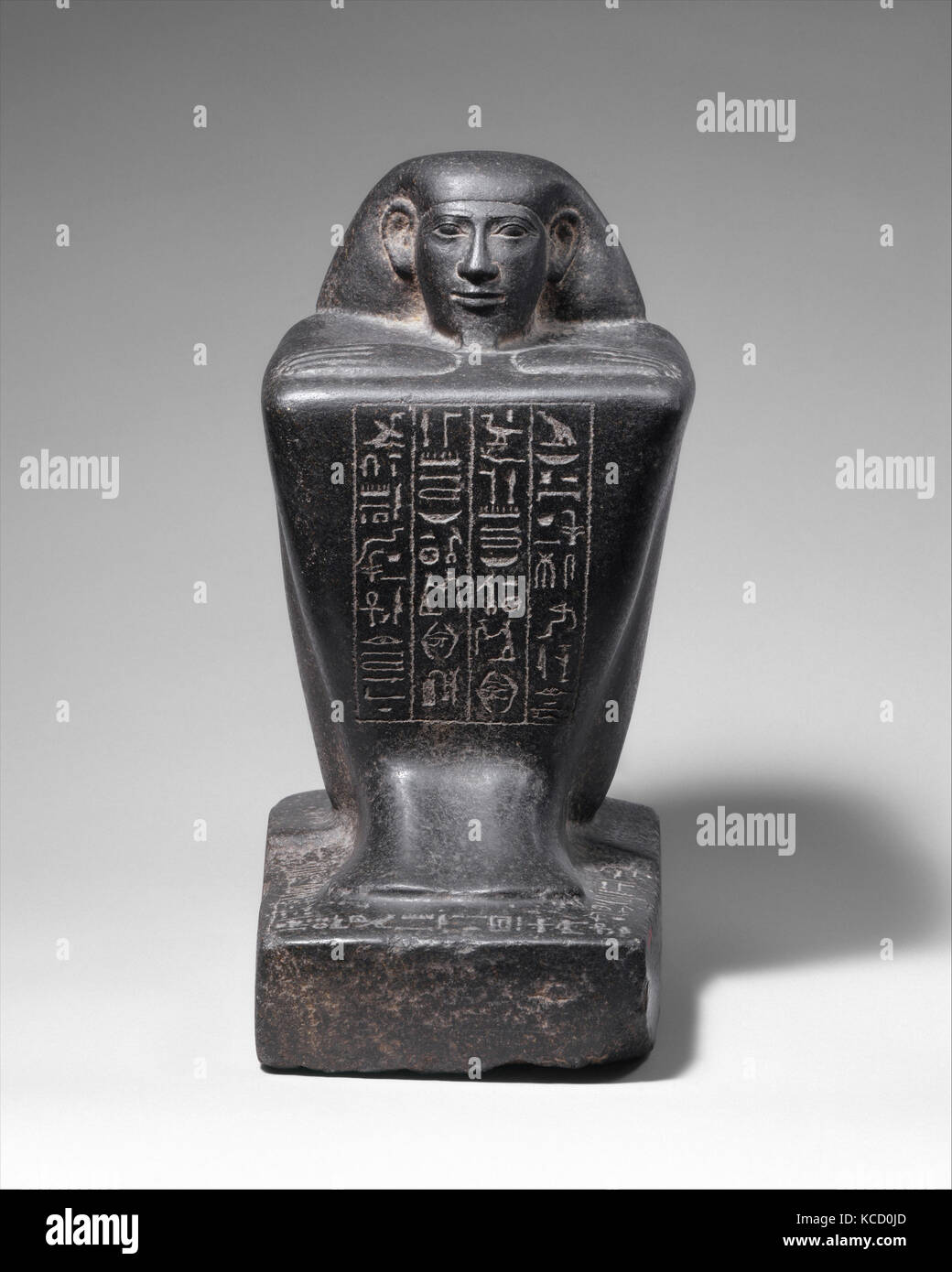 Block Statue of a Prophet of Montu and Scribe Djedkhonsuefankh, son of Khonsumes and Taat, 690–610 B.C Stock Photo