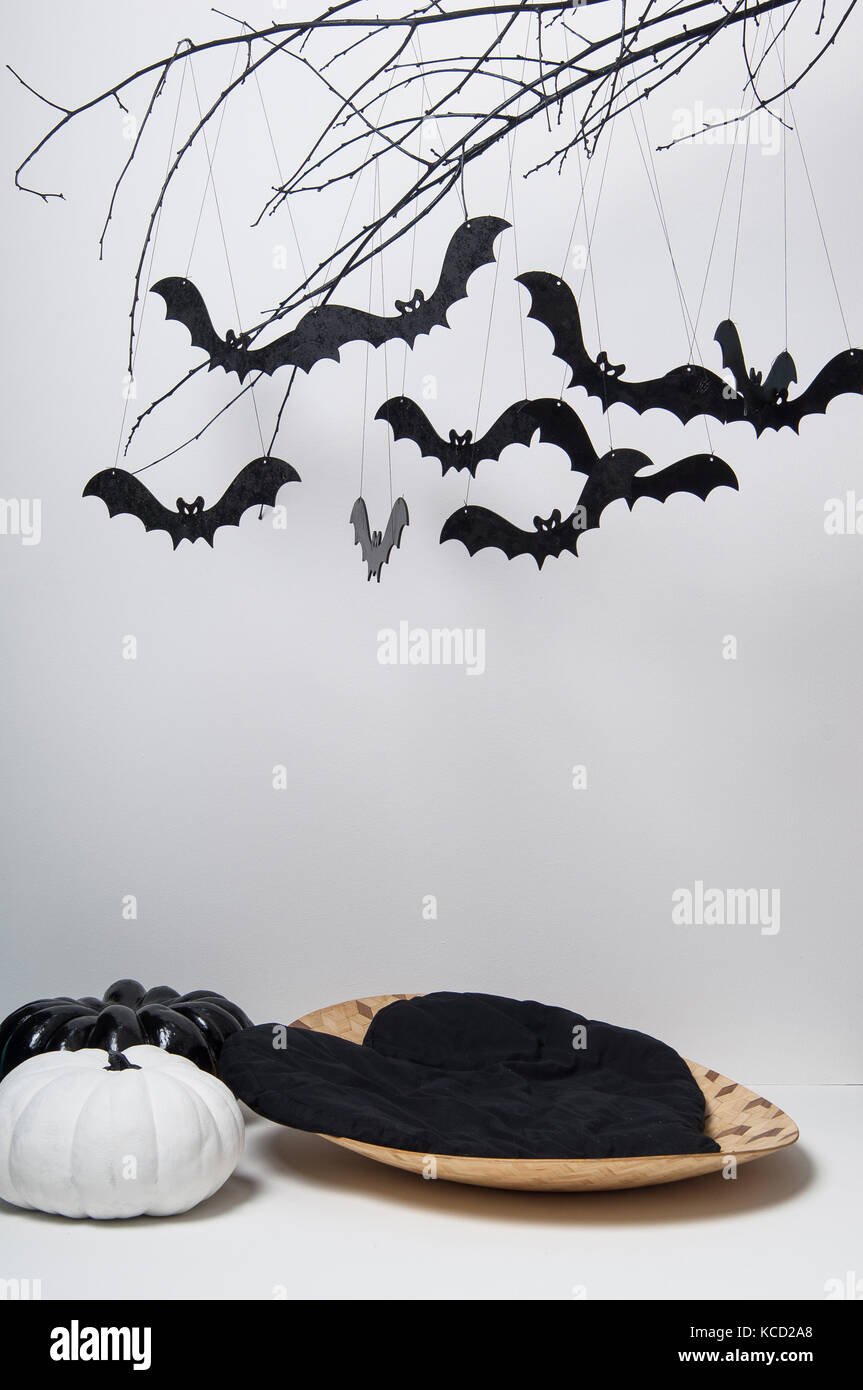 halloween silhouettes with many black bats on a tree branch and a ...
