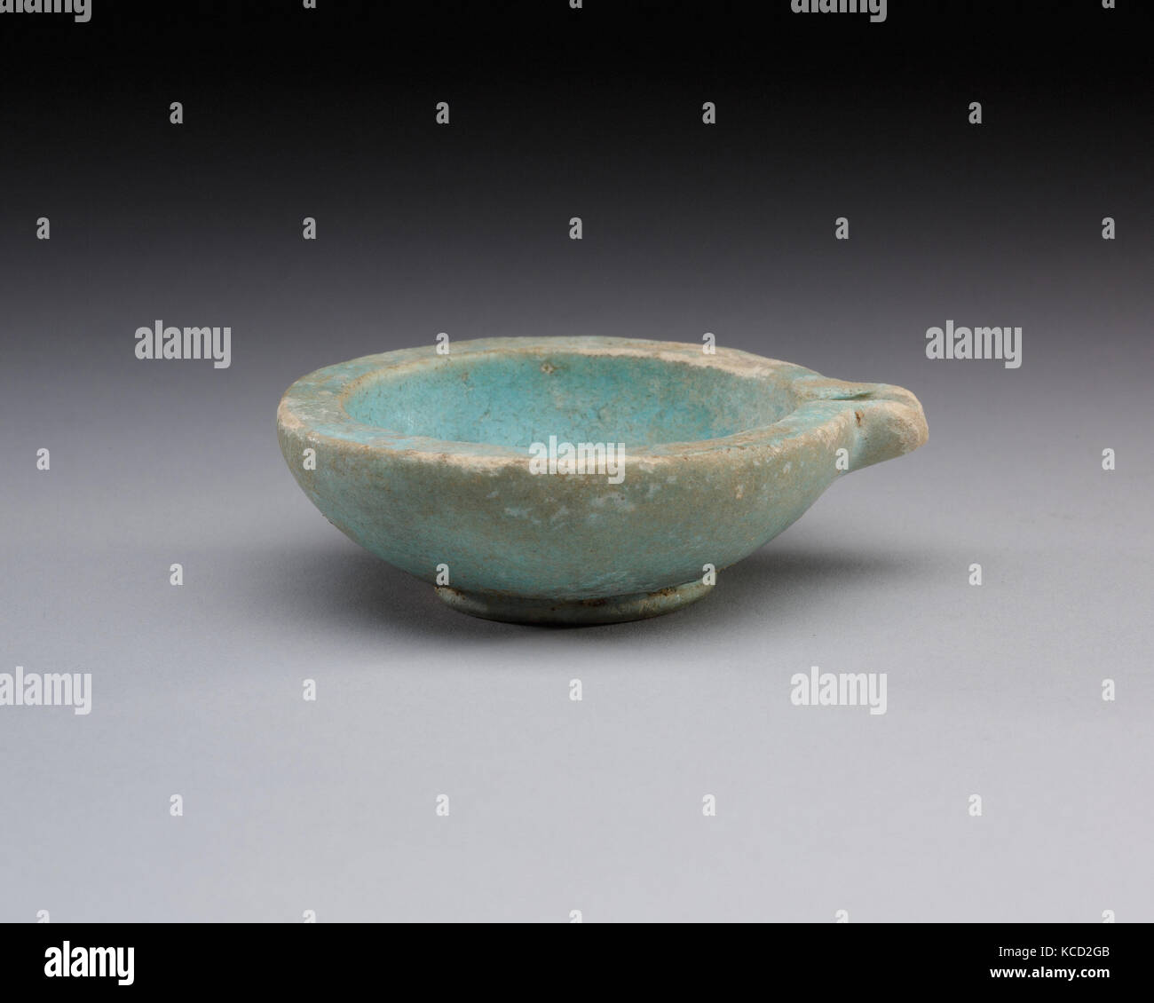 Spouted dish with rosette in the center, traces on the rim where two lions were attached, 3rd century BC Stock Photo