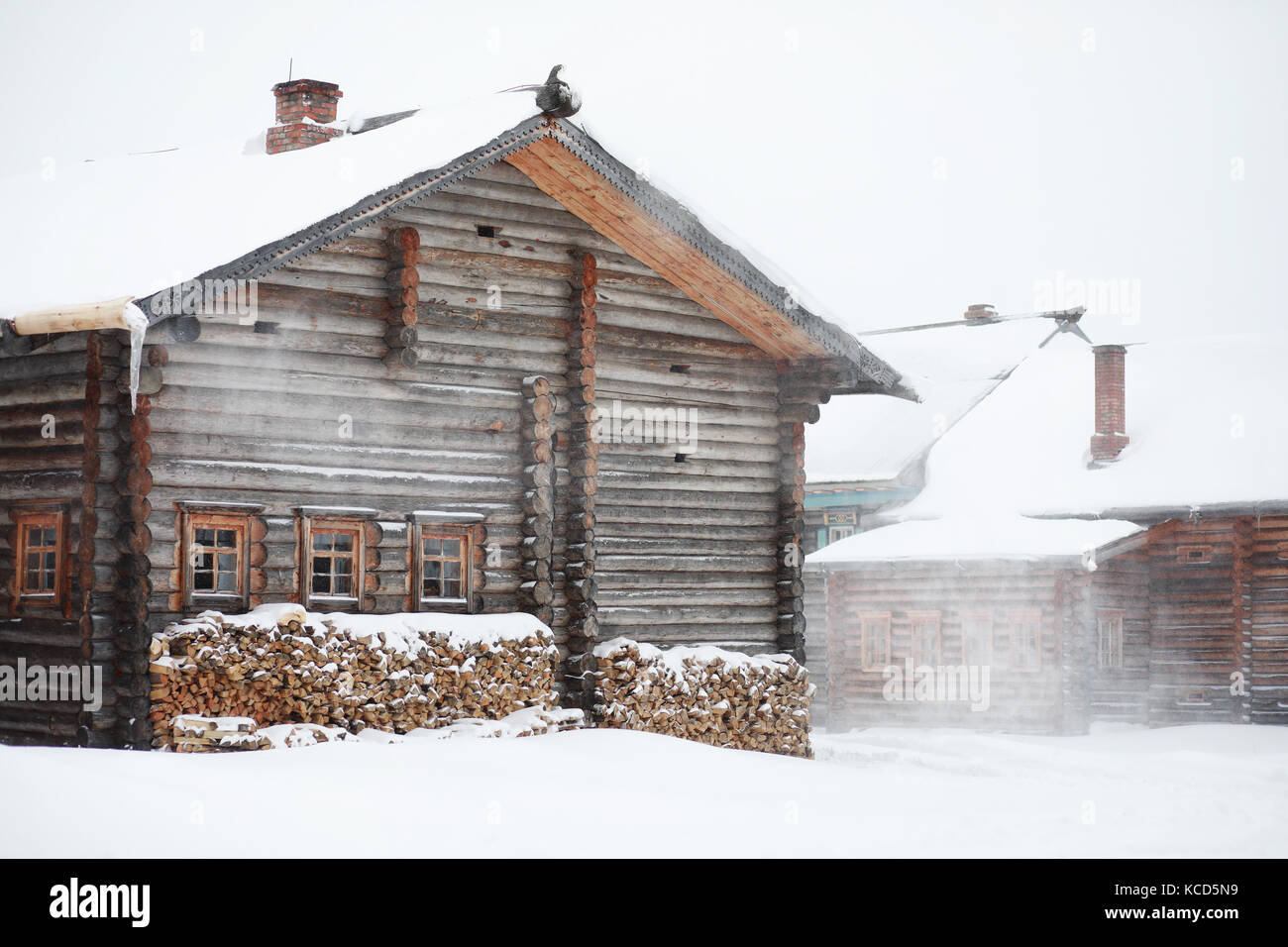 retro wooden house in the forest in russian north Stock Photo - Alamy