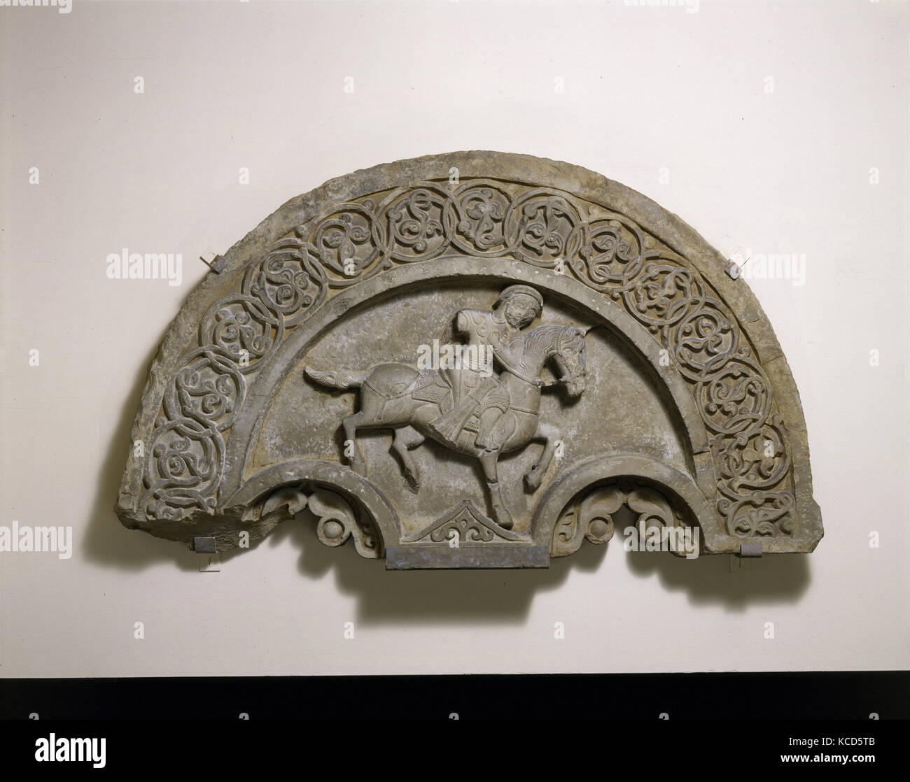 Tympanum with a Horse and Rider, second half 14th century Stock Photo