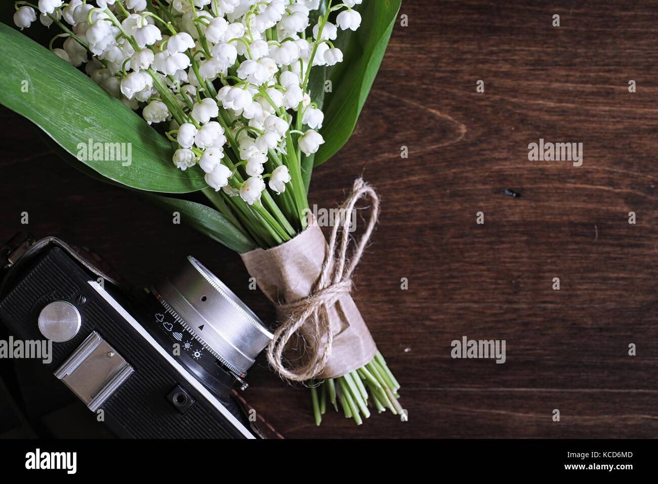 Bouquet of lilies of the valley on a table Stock Photo - Alamy