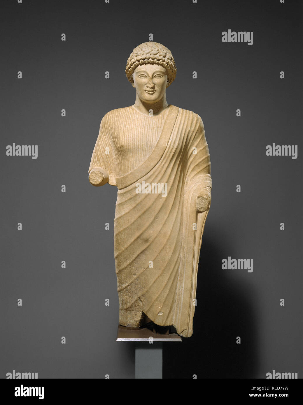 Limestone statue of a youth, early 5th century B.C Stock Photo