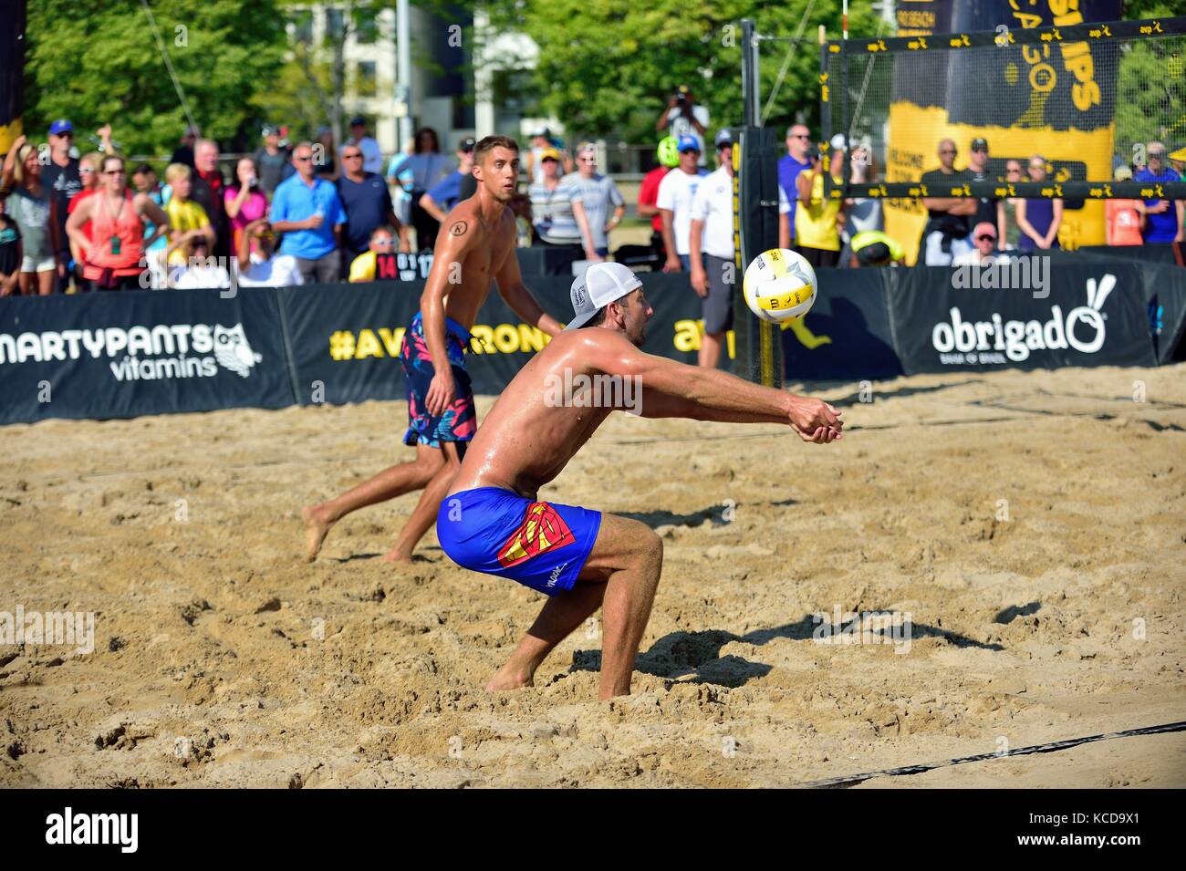 Player performing shot to set up partner for a kill shot  at the AVP 2017 Men’s Chicago Championships. Chicago, Illinois, USA. Stock Photo