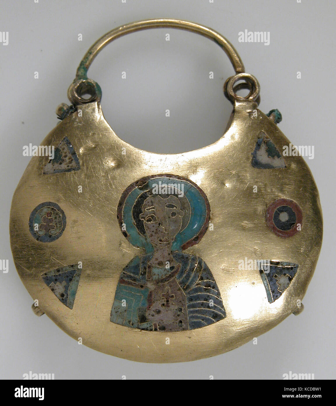 One of a Pair of Temple Pendants, with Busts of Male Saints Holding Martyr's Cross (front) and Leaf and Rosette Motifs (back Stock Photo