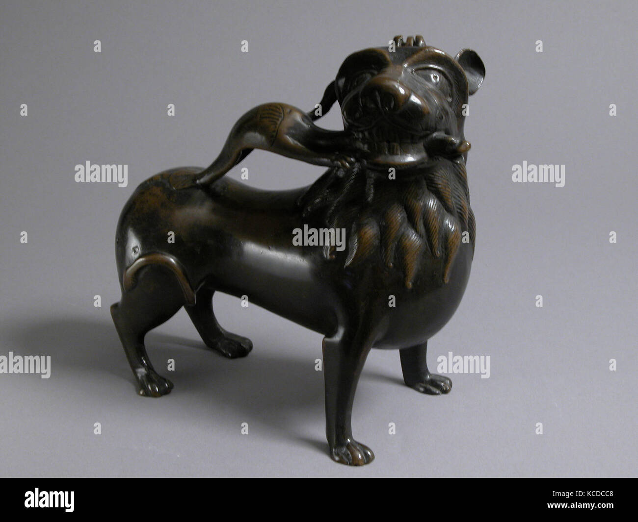 Aquamanile in the Form of a Lion, ca. 1200, North German, Copper alloy, Overall: 9 1/8 x 8 15/16 x 3 3/4 in. (23.2 x 22.7 x 9.5 Stock Photo