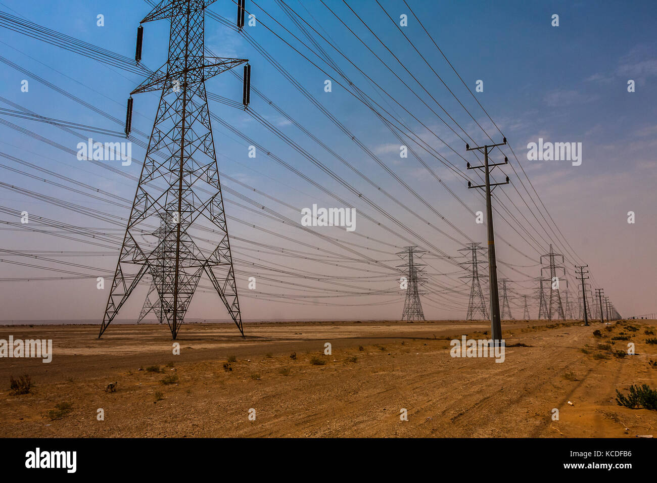 A highvoltage power line in Riyadh Province, Saudi Arabia Stock Photo