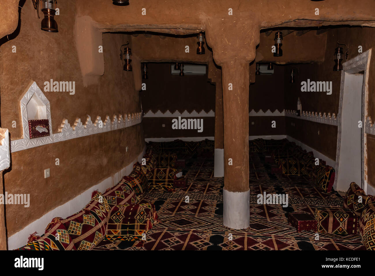 A room in the female section of a traditional Arab mud house, Riyadh Province, Saudi Arabia Stock Photo