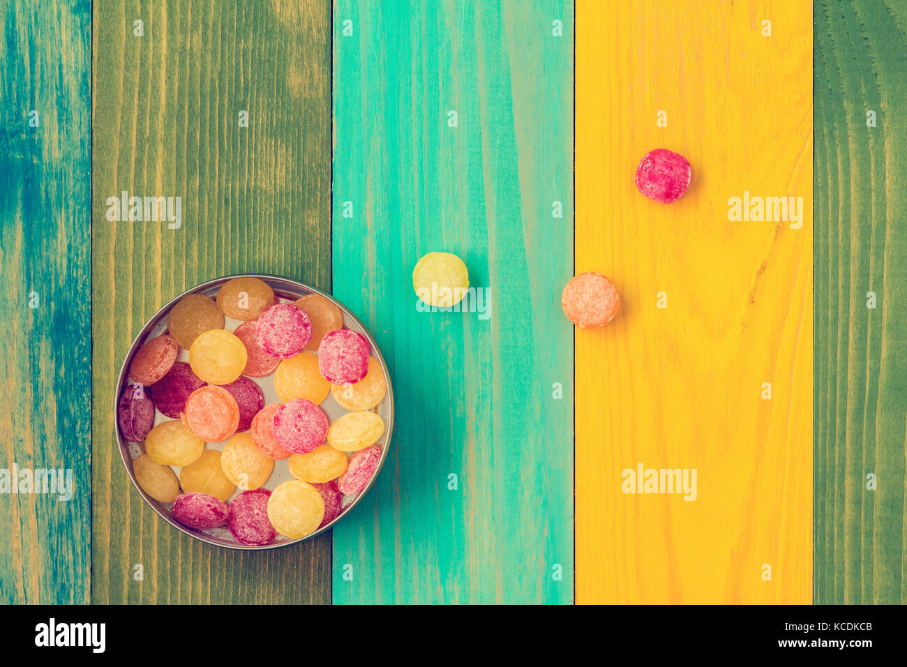 Multi colored candy in metal box, top view Stock Photo - Alamy