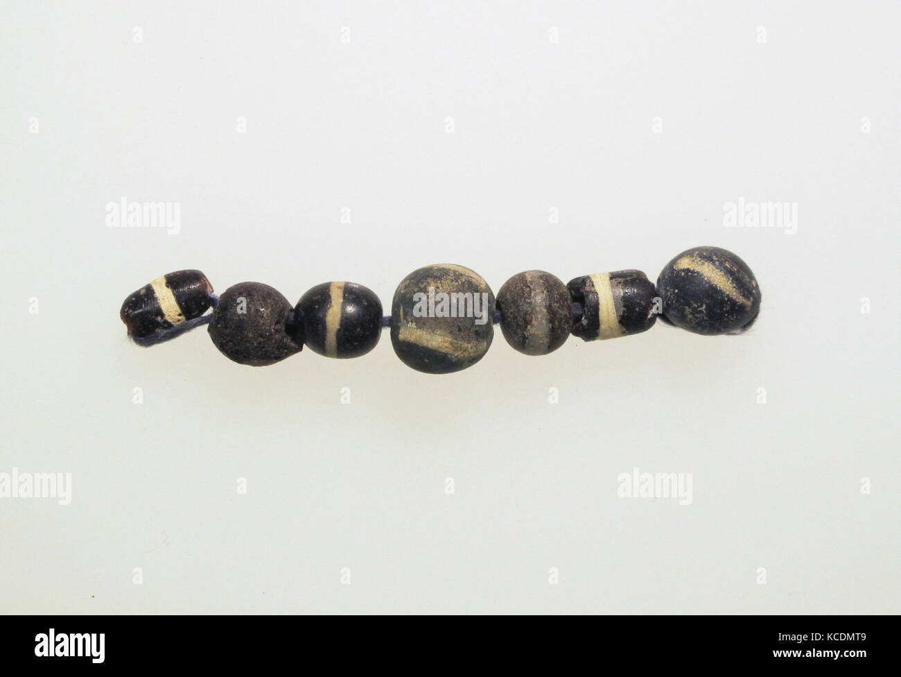 Beads, 7, Roman, Glass, Other: 2 1/2 in. (6.3 cm), Glass Stock Photo