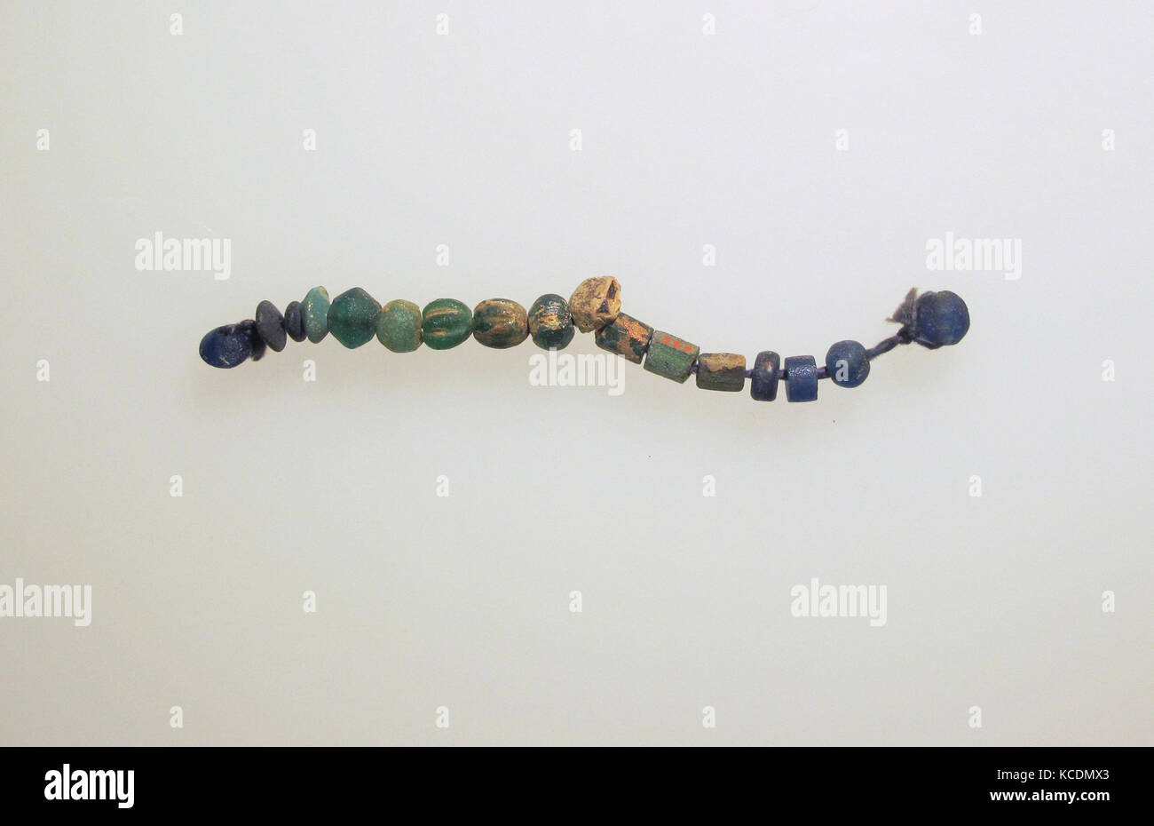 Beads, 17, Roman, Glass, Other: 4 1/4 x 5/16 in. (10.8 x 0.7 cm), Glass Stock Photo