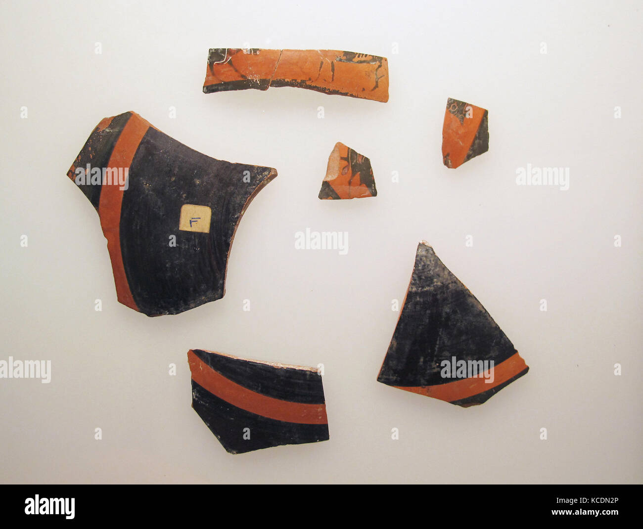 Six fragments of a terracotta kylix: band-cup (drinking cup), 3rd quarter of the 6th century B.C Stock Photo