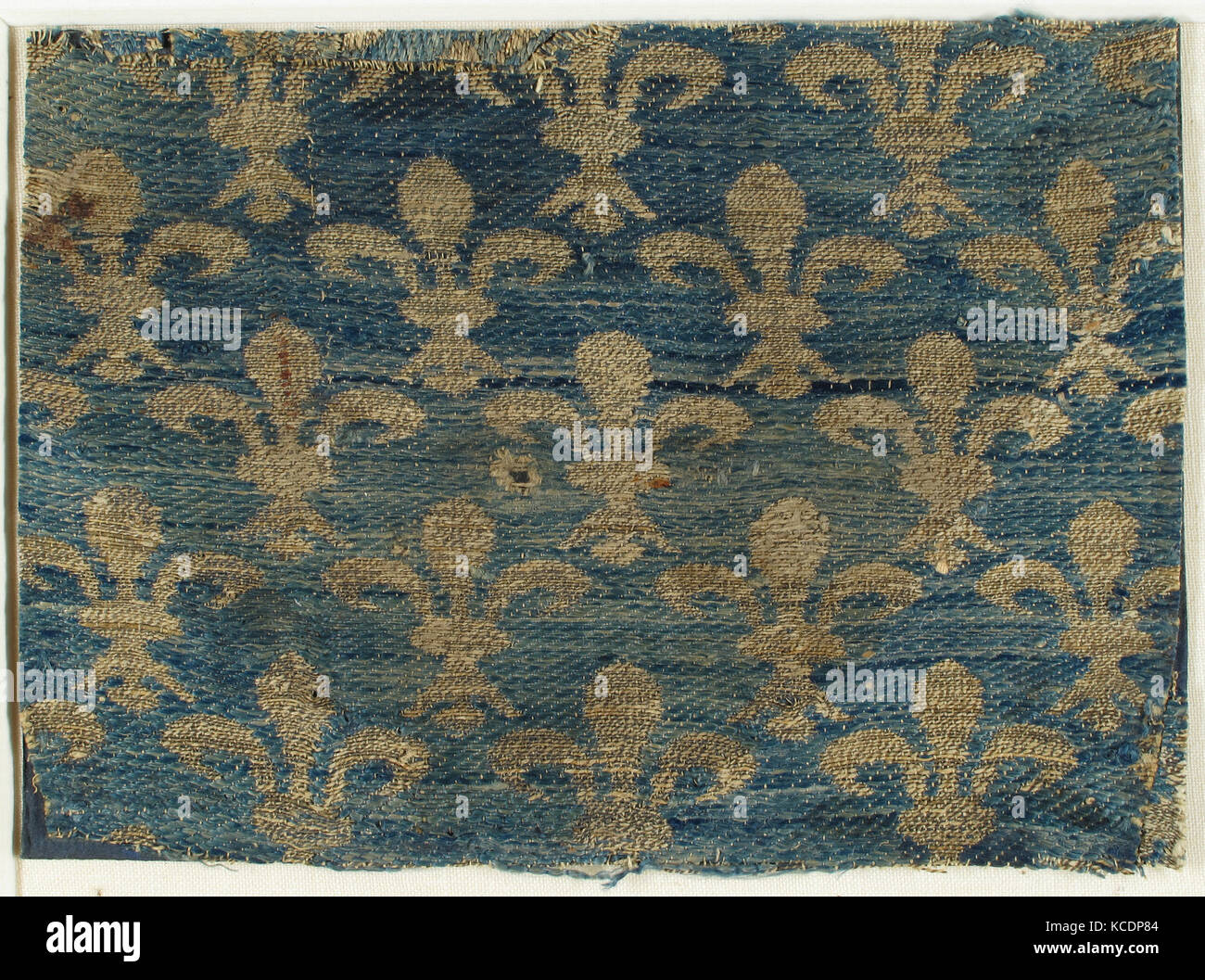 Textile with Fleur-De-Lis Motif, 13th century, Made in Sicily, Italy, Italian, Silk, metal thread, Overall: 3 1/8 × 4 1/8 in. (8 Stock Photo