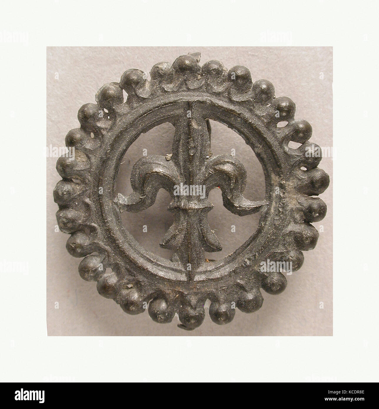 Badge with Lily of Purity, 14th–15th century, British, Tin/lead alloy, Overall: 3/16 x 1 1/16 in. (0.5 x 2.7 cm), Metalwork-Tin Stock Photo