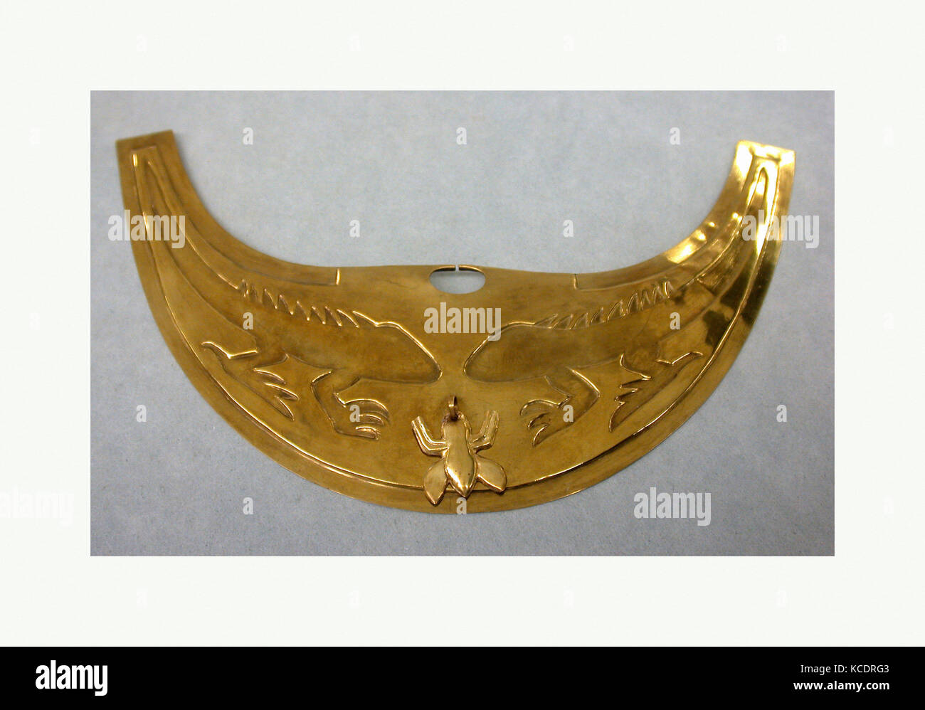 Nose Ornament, 390–450, Peru, Moche (Loma Negra), Gold, stone, H. 4 1/8 x W. 6 13/16 x D. 3/8 in. (10.5 x 17.3 x 1 cm), Metal Stock Photo