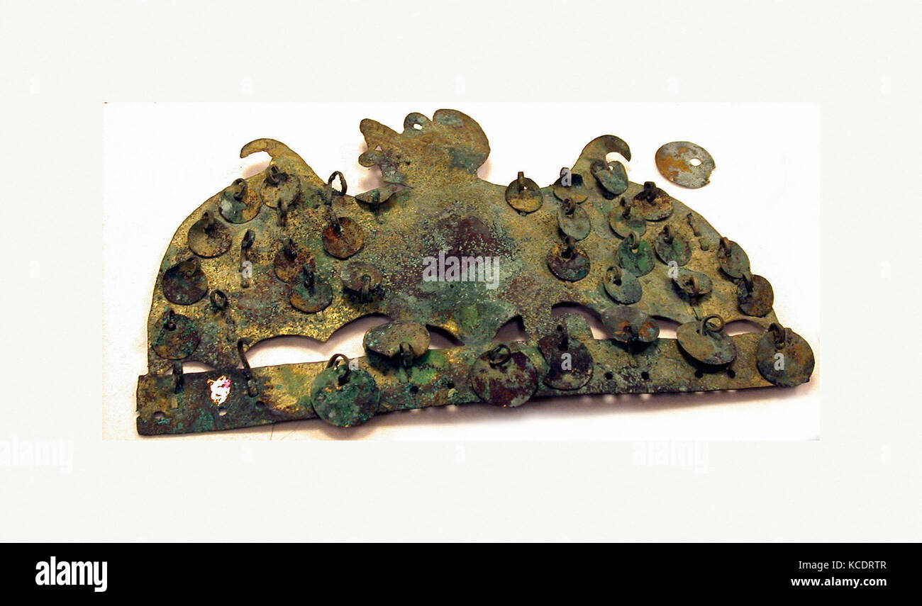 Animal Ornament, 390–450, Peru, Moche (Loma Negra), Gilded copper, H x W: 3 1/4 x 5 9/16in. (8.3 x 14.1cm), Metal-Ornaments Stock Photo