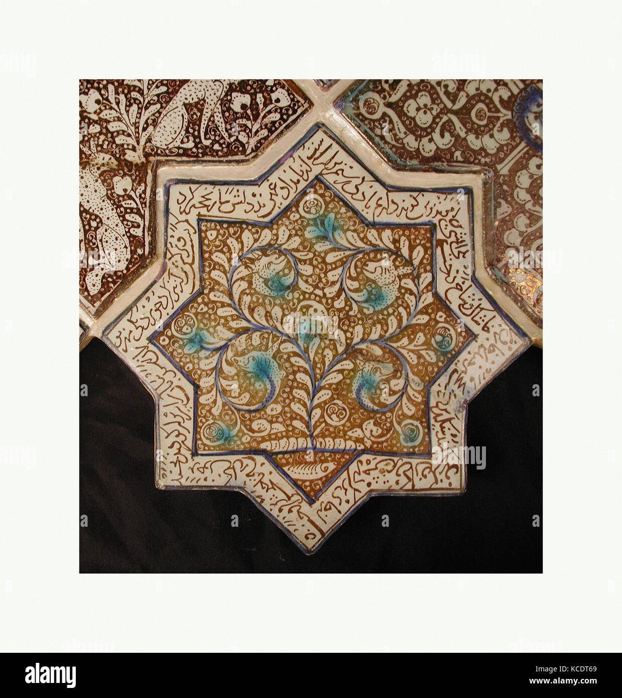 Star-Shaped Tile, 13th–14th century, Made in Iran, probably Kashan, Stonepaste; inglaze painted in blue and turquoise and luster Stock Photo