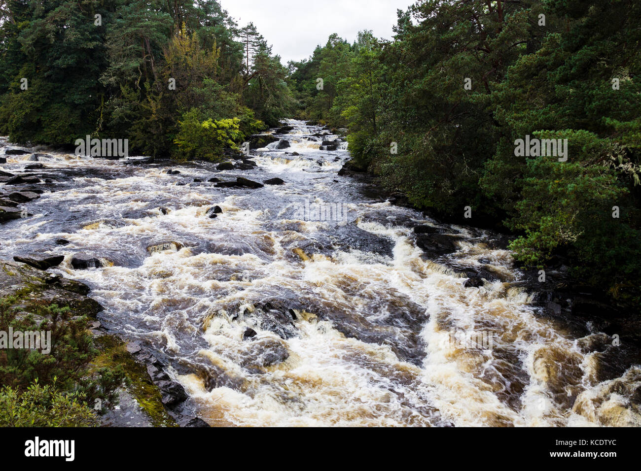 The Falls of Dochart run through the small town of Killin, in Loch Lomond & The Trossachs National Park, Scotland. Stock Photo
