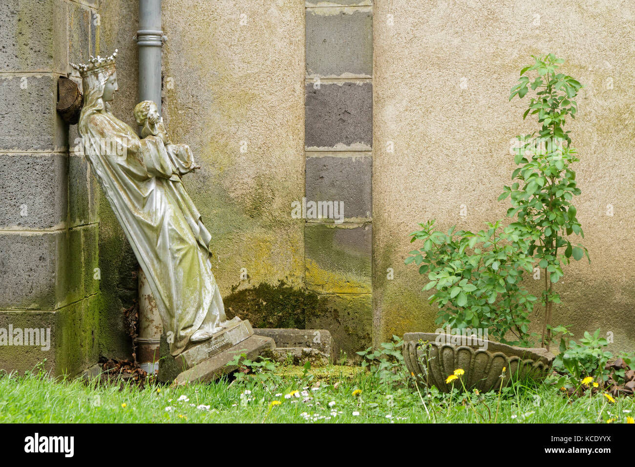 PONTGIBAUD, FRANCE, May 6, 2016 : An old statue in Chateau-Dauphin medieval castle. The castle owes its name to the coat of arms of the Count of Auver Stock Photo