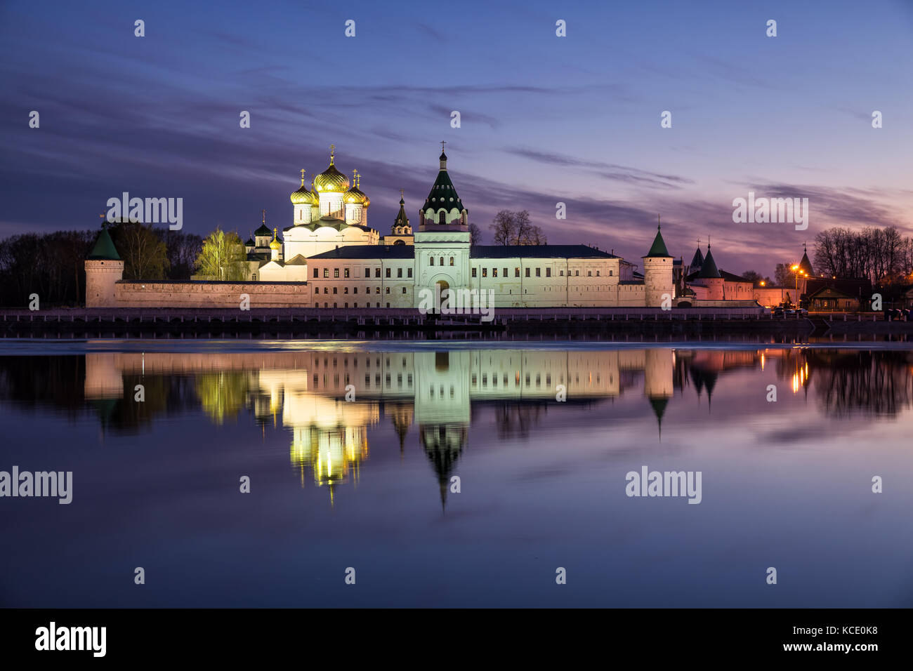 Illuminated Ipatievsky monastery reflected in water of the river ...