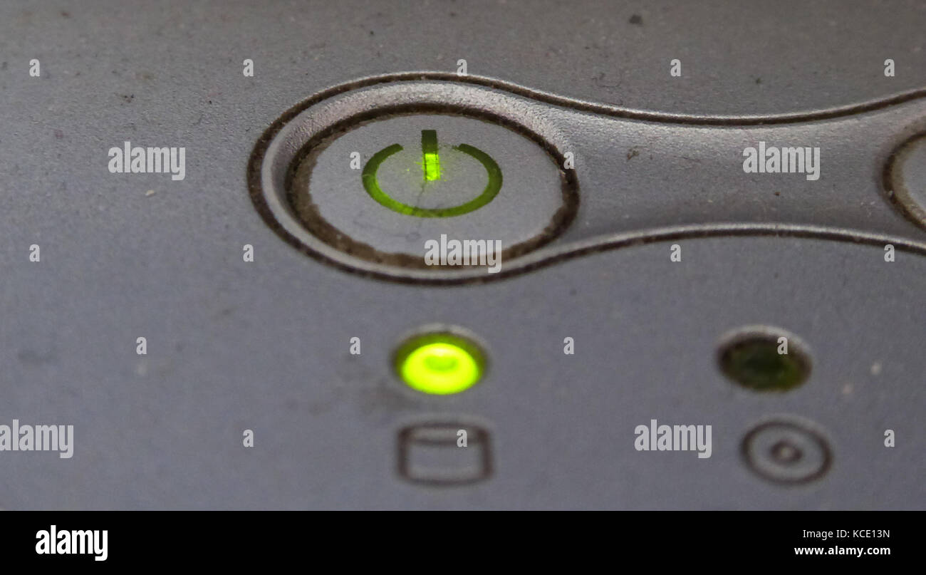 Dirty and dusty switch button (On/Off) on a laptop Stock Photo - Alamy