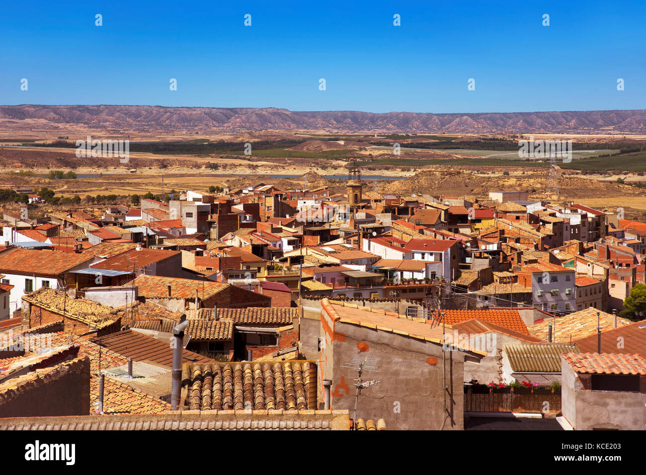 an aerial view of the roofs of the old town of Caspe, in Spain, highlighting the bell tower of the Colegiata de Santa Maria la Mayor Stock Photo