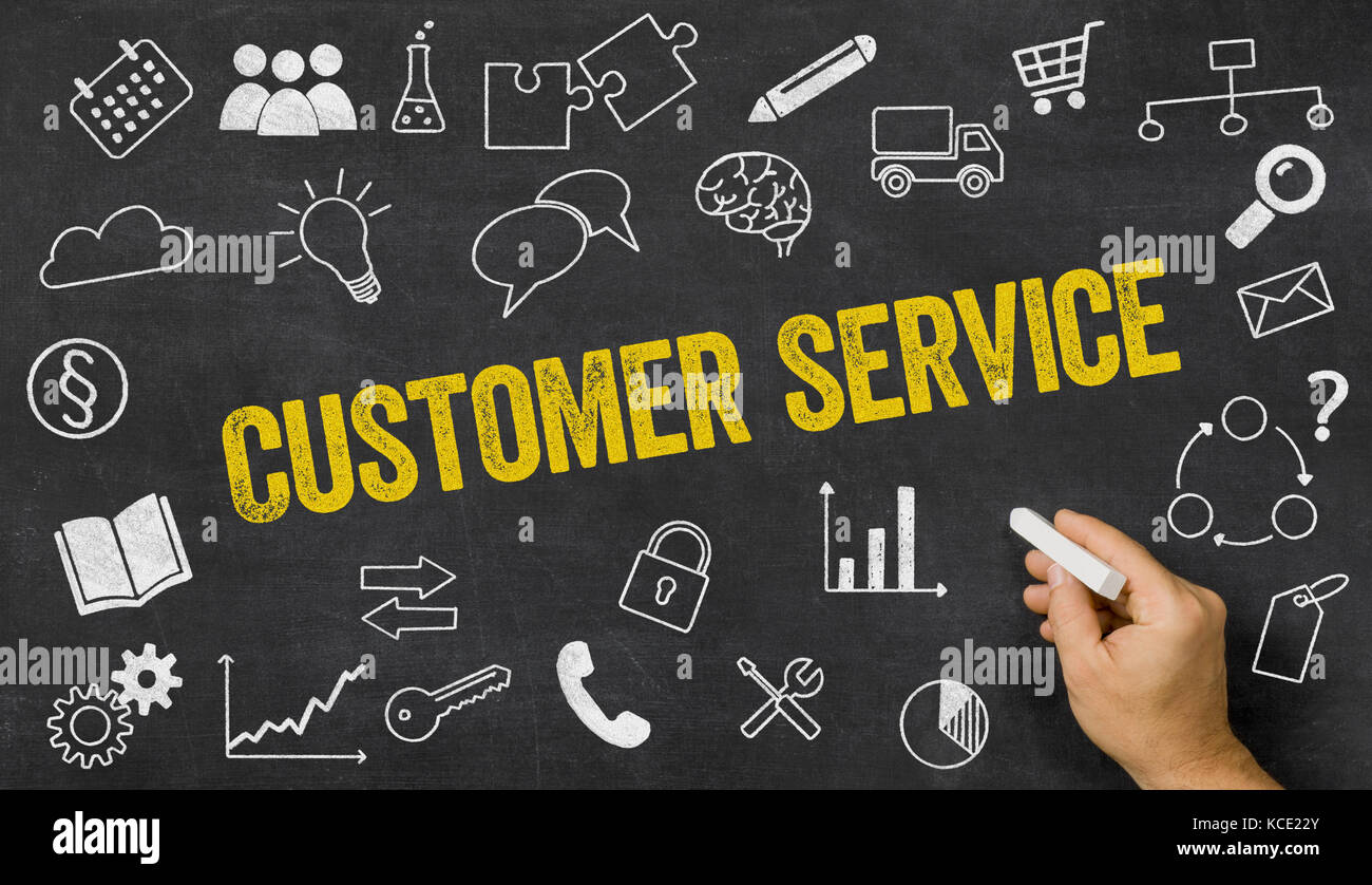 Customer service written on a blackboard with icons Stock Photo - Alamy
