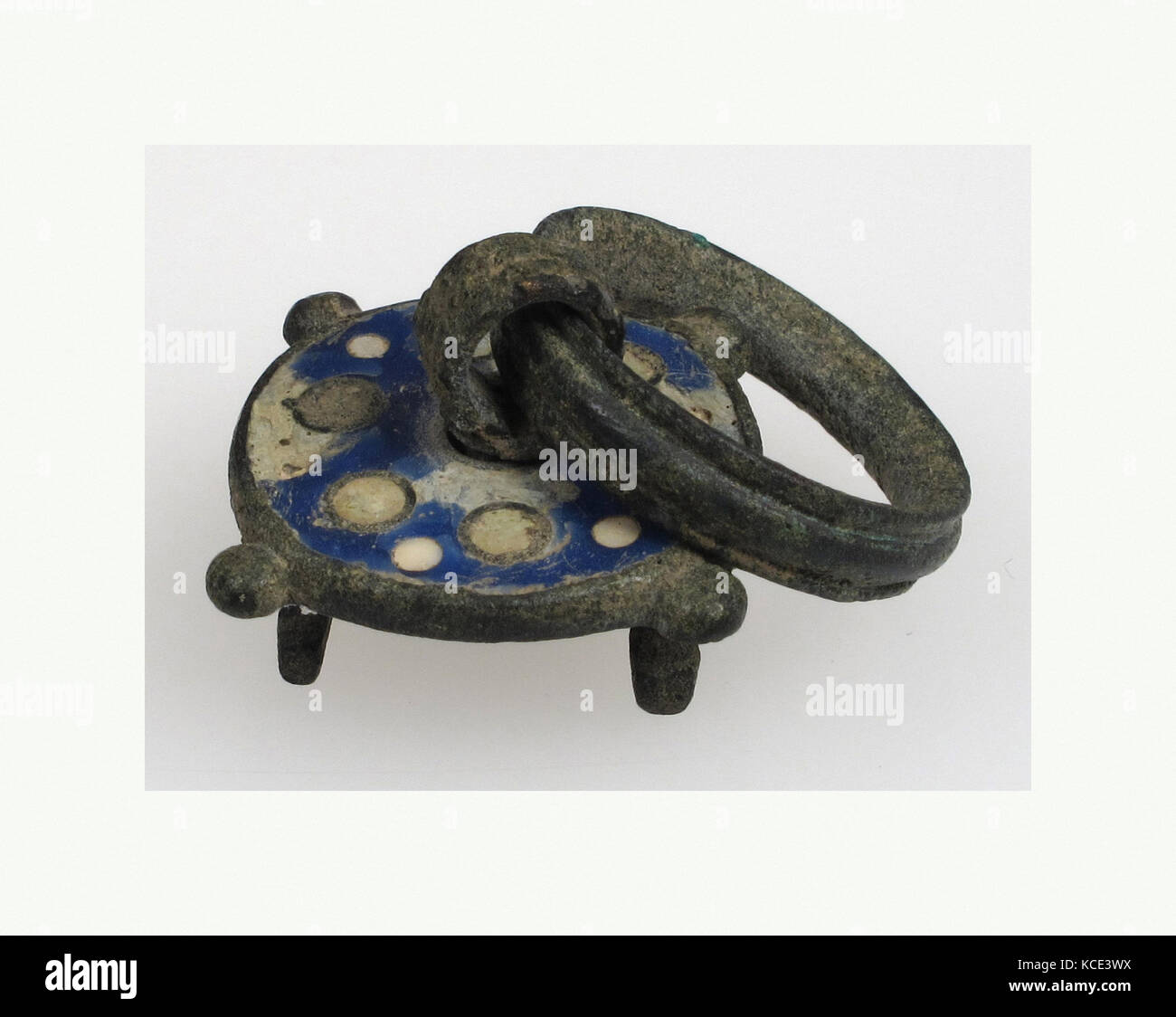 Vessel Lid, 2nd–3rd century, Roman, Champlevé enamel, floating cloisons, copper alloy, Overall (handle up): 1 5/16 x 1 in. (3.3 Stock Photo