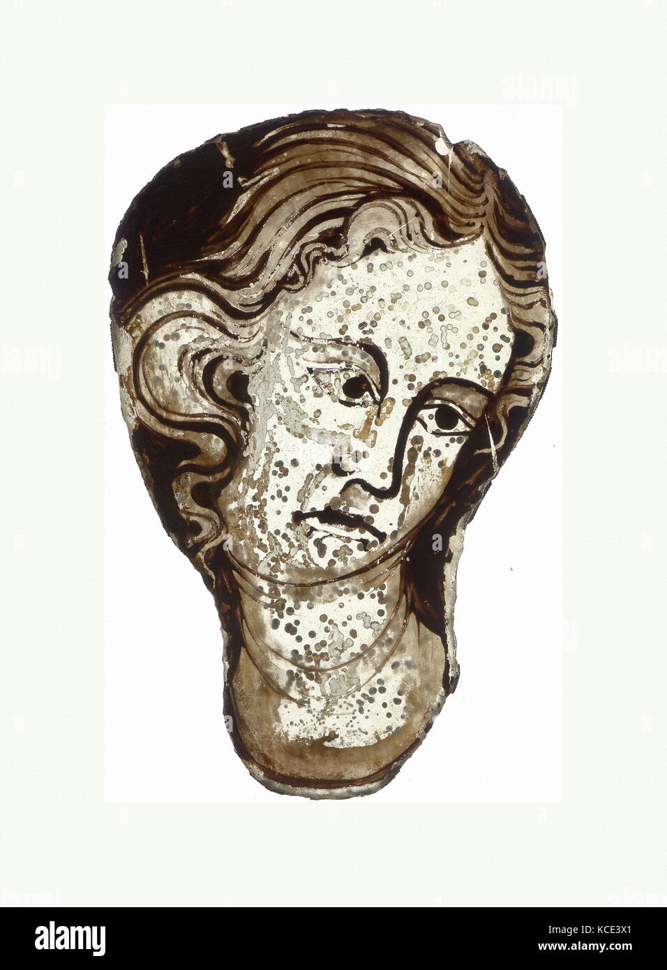 Head of a Young Woman, early 14th century, North French, Colorless glass and vitreous paint, Overall: 5 3/16 x 3 5/16 x 1/8 in Stock Photo